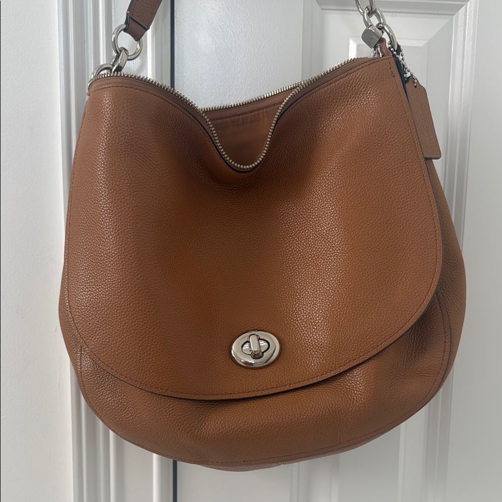Coach Brown Hobo Bag with Leather Material and Silver Hardware